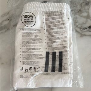 Adidas White Shorts with Black Stripes (boys xs)